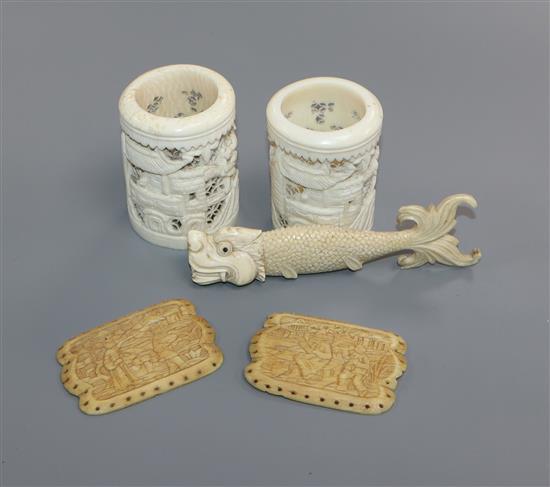 A Chinese carved ivory handle and three other pieces